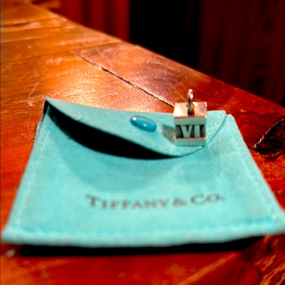 Tiffany & Co. Vintage Atlas Roman Numerals Charm , 925 Sterling Silver.